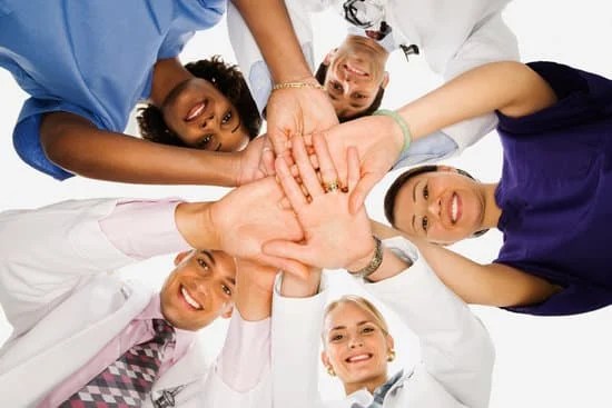 huddled healthcare workers